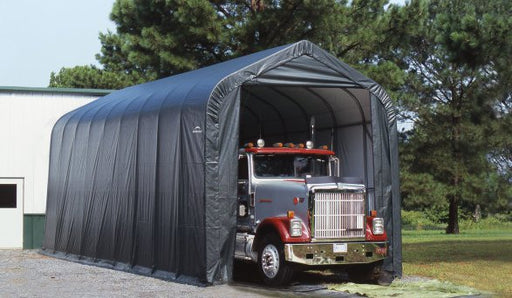 ShelterLogic ShelterCoat 16 x 36 ft. garage with truck parked inside. This gray, peak-style garage provides ample storage for vehicles and other equipment.