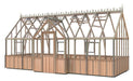 Side profile of the 9x20 Alton Cambridge Greenhouse featuring its spacious design and elegant cedar panelling.