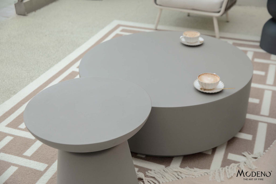 Coffee setup with the Elementi Kylix Series large side table in space grey next to a larger table.