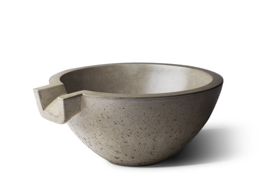 A Slick Rock Concrete Spill Water Bowl Classic, a gray concrete bowl with a rounded shape and a spout-like cutout on one side.