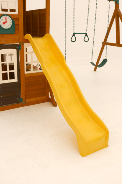 The yellow slide of the Kidkraft playset