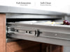 Full-extension, soft-close ice tray drawer on the NewAge Classic Bar Cabinet, partially open with fresh fruit inside.
