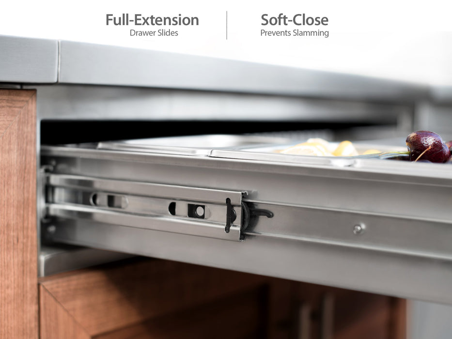 Full-extension, soft-close ice tray drawer on the NewAge Classic Bar Cabinet, partially open with fresh fruit inside.