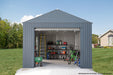 Sojag Everest Garage 12 x 15 ft. in Charcoal with tools inside on a cement foundation