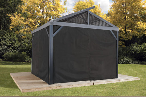 Enjoy privacy and shade in your outdoor living space with Sojag curtains. This image showcases a Sojag gazebo with closed black curtains, creating a private and comfortable outdoor retreat