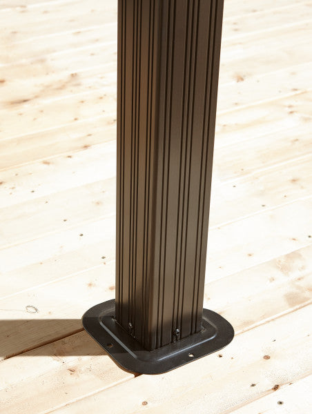 Metal pole on wooden deck, part of Sojag Genova II Double Roof Gazebo 12 x 16 ft Dark Brown.