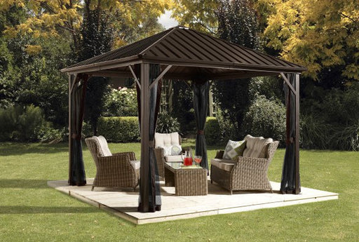 Sojag Meridien Hardtop Gazebo 10 x 10 ft,  with mosquito netting, outdoor furniture, on lawn.