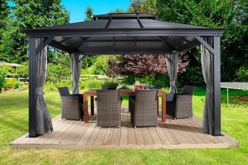 Sojag Mykonos 12 ft. x 14 ft. Dark Gray Double Roof Gazebo with Dining Set in Backyard Setting