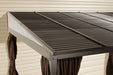 Top view of Sojag Portland Wall-Mounted Gazebo roof, showing dark brown galvanized steel panels.