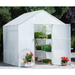 White Solexx Garden Master Greenhouse with peak roof design, open doors revealing interior shelving and greenery