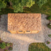 SpaceSaver 12x4 lean-to shed with sliding doors, showing wood paneling and roof slope construction detail.