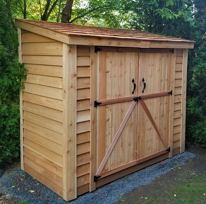 SpaceSaver 8x4 wooden shed with double doors, perfectly fitting in a backyard setting.