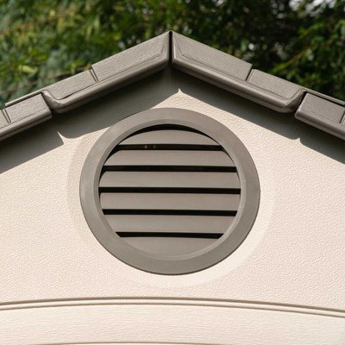 Close-up of the Lifetime storage shed's gable vent and roof peak detail.