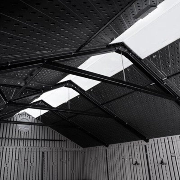 Interior view of the Lifetime storage shed looking up at the roof trusses and five skylight panels.