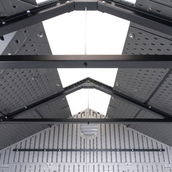Interior view of the Lifetime side entry storage shed looking up at the roof trusses and skylight panels.