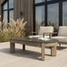Stratton outdoor coffee table coordinating sectional couch patio lifestyle