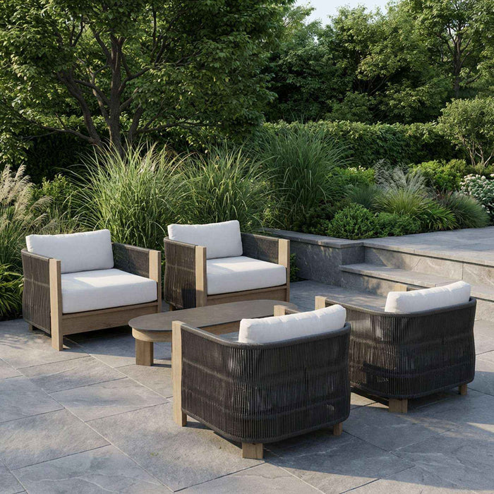 Stratton outdoor lounge chair lifestyle setting with coordinating patio furniture