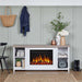 Real Flame Tramore white electric fireplace TV stand in a farmhouse entryway with sage green paneled wall, decorative vases, wire baskets, black chair, and coats on hooks