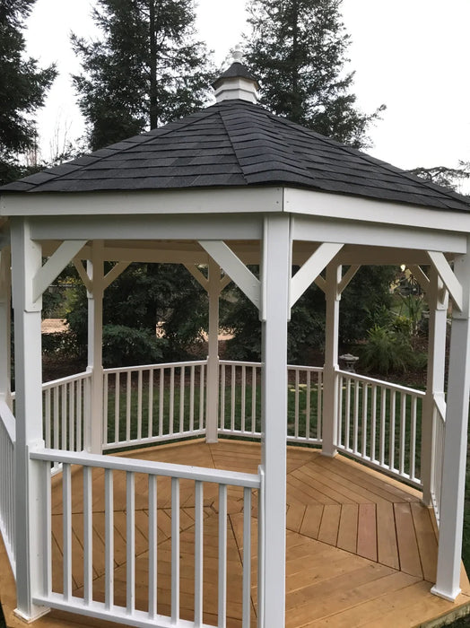 12 Foot Vinyl Gazebo-In-A-Box with Floor surrounded by trees