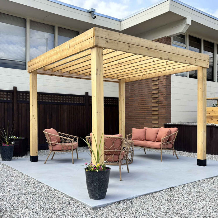 Outdoor Living Today Urban Escape Pergola Kit 10x10 installed over a modern patio with rattan lounge seating