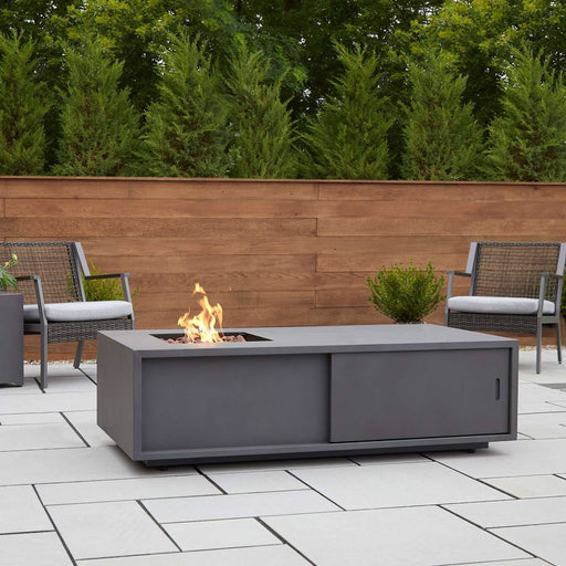 Vance propane fire table outdoor lifestyle patio setting with flames lit