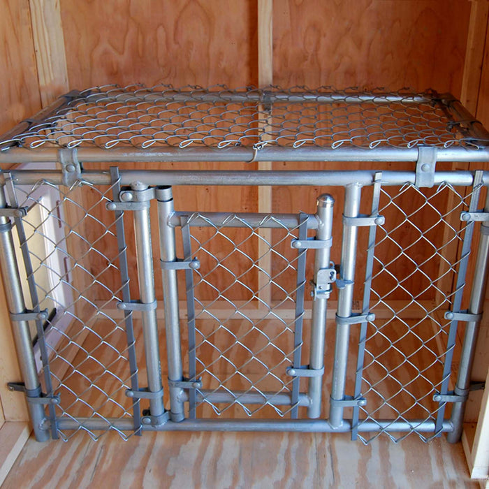 Interior view of Little Cottage Co. Victorian Cozy Kennel showing chain-link divider and wooden flooring