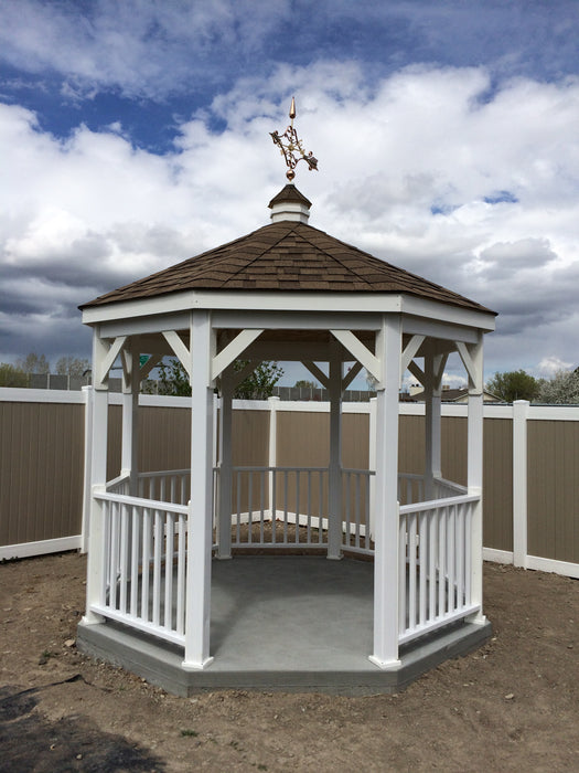 Gazebo-In-A-Box with Floor with a weathervane on top