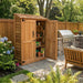 Side angle view of the Outdoor Living Today Garden Chalet 4x2, a western red cedar garden shed with double doors.