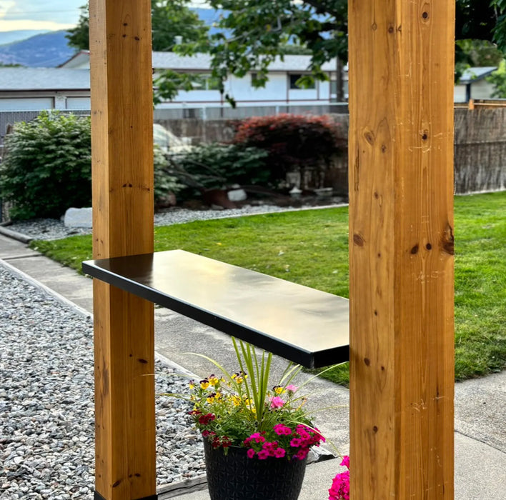 Western red cedar grill gazebo providing shade and weather protection for an outdoor patio BBQ setup