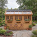 Detail view of the western red cedar Sunshed garden shed 8x12, showcasing its wood grain and construction.
