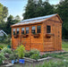 Side angle view of the Outdoor Living Today 8x12 Sunshed garden shed built from western red cedar.