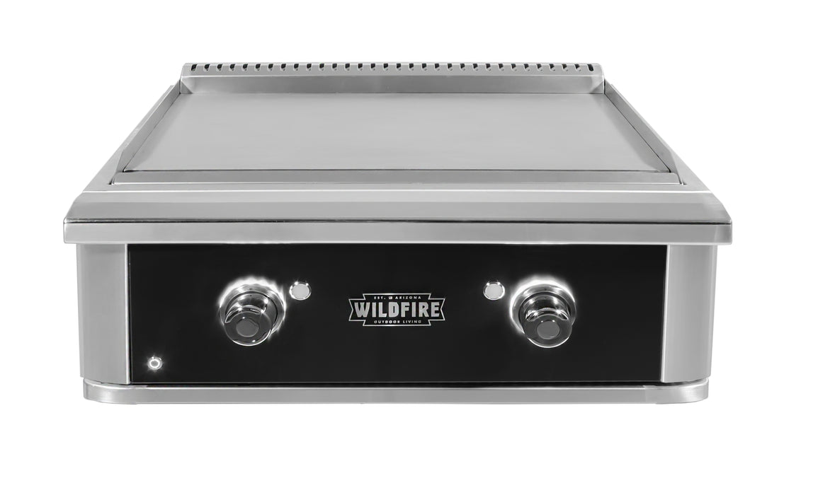 Front view of a Wildfire PRO 30-inch griddle. It has a sleek stainless steel design, a large flat cooking surface, and two black control knobs with indicator lights.