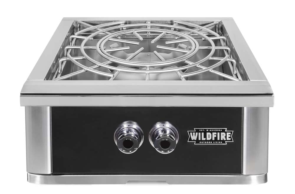 Front view of the Wildfire Ranch Pro power burner with control knobs and protective grill top