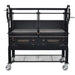 Sunterra 60 inch dual grate grill with windbreak panel installed, front view of the Argentine side brasero design.