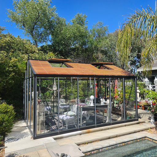 Wood slatted shades installed on a greenhouse in California, providing natural shade and style while keeping the interior comfortable for plants.
