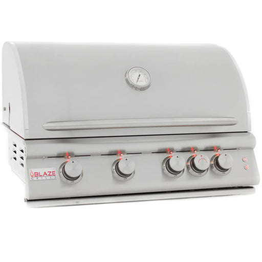 A grey outdoor Blaze Grills 4-5 Burner LTE Gas Grill with Rear Burner and Built-in Lighting System with knobs and dials.