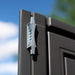 A close up detail of door latches of a storage cabin 