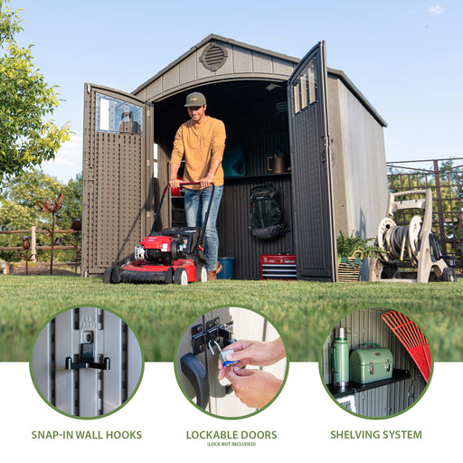 A man is mowing his lawn by a shed featuring snap-in wall hooks, lockable doors, and shelving system