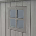 A close up details of the window of a shed
