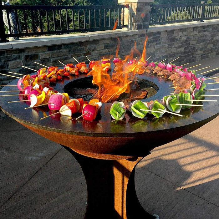 Delicious vegetable skewers being cooked on an Arteflame Classic 40" grill with a unique heat pattern.
