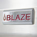 Close-up of the Blaze Grills logo badge on the 32-Inch Charcoal Grill, showcasing the brand's signature design