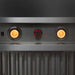 Image showing the illuminated control knobs of the Blaze Grills 36-Inch Vent Hood, set against a dark background to highlight the orange glow and ease of use.
