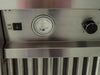  Close-up of the stainless steel control panel on the Blaze Grills 42-Inch Vent Hood, featuring an illuminated light and power switch for operational ease.