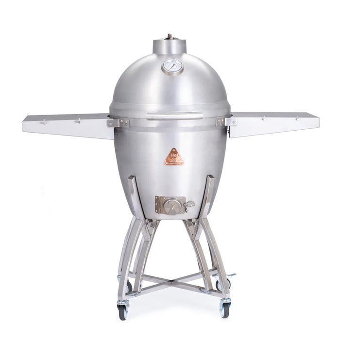 Full view of the Blaze Grills Kamado Cart featuring a cast aluminum kamado grill with side shelves extended, set on a stainless steel cart with wheels.