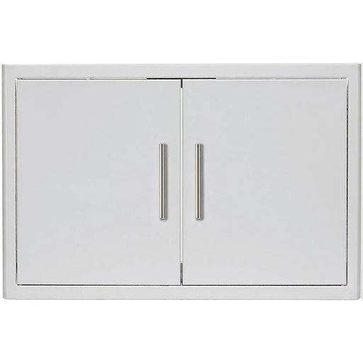A Blaze Grills Stainless Steel Enclosed Dry Storage Cabinet with Shelf with two doors on a white background.