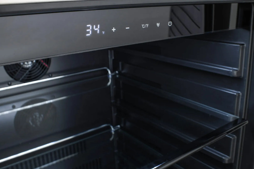 A Blaze Grills 24-Inch Outdoor Refrigerator with LED lighting and a digital display.