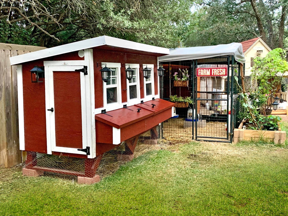 The OverEZ XL Chicken Coop in classic red, merging style with functionality, equipped to provide shelter for 20 chickens, and designed for longevity.