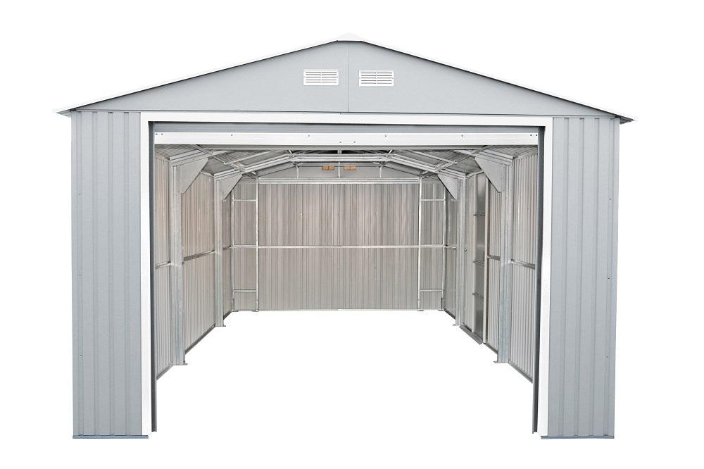Inside view of the Duramax Imperial metal garage, 12x20 in light gray, empty with visible metal framing and open rear exit.
