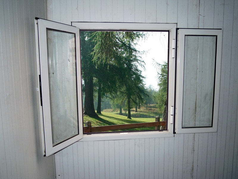 Duramax Gable Roof Building 16x10 - Backyard Oasis forest view out the window