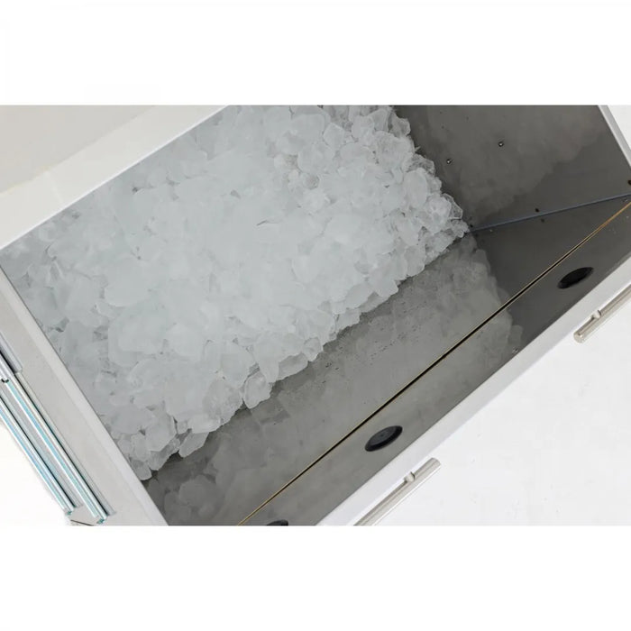 A Blaze Grills 30-Inch Insulated Ice Drawer filled with ice cubes, perfect for cold beverages in an outdoor kitchen.